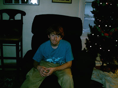 Dan Travis in his living room at Christmas