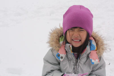 Girl crying in the snow